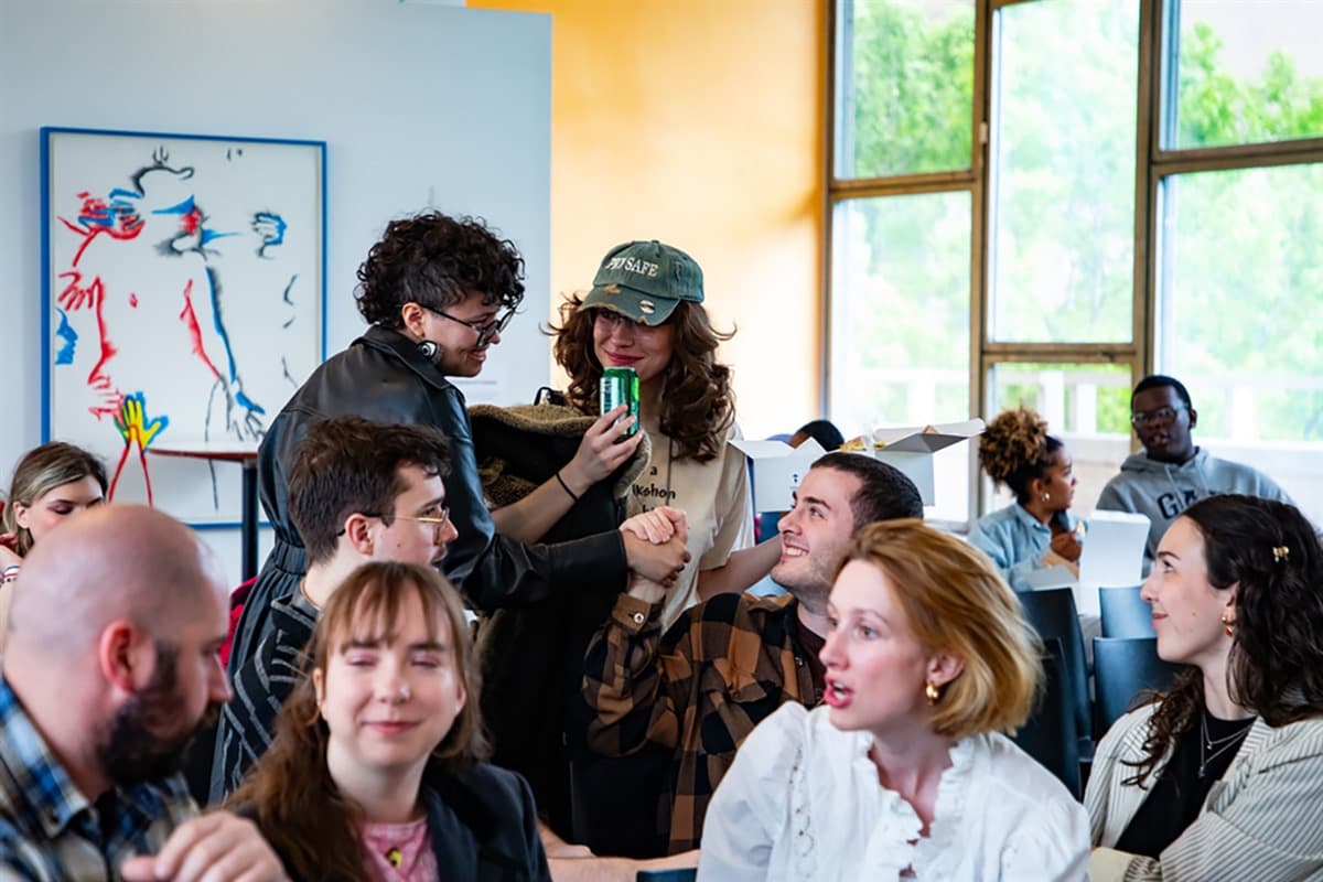 New School Alumni gather in Wollman Hall for a closing performance and reception created by the School of Drama.