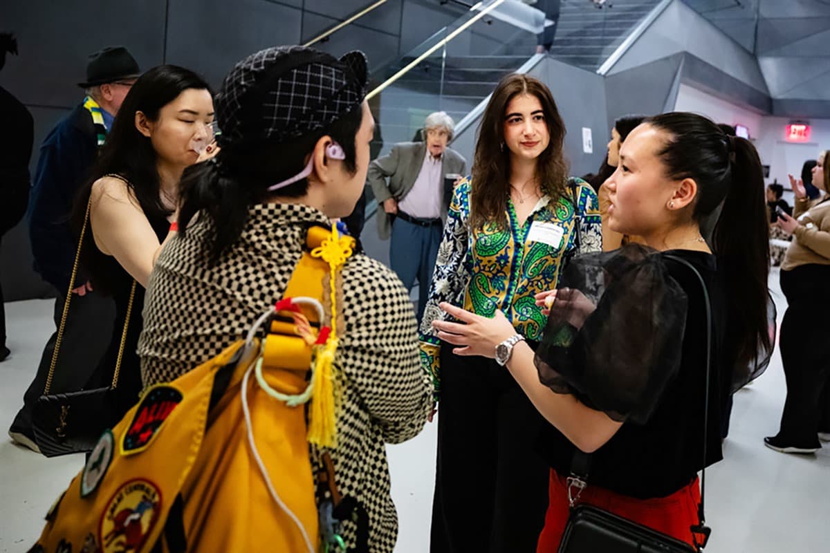 Alumni socialize and reconnect during our first evening of Reunion programming, the Forever New reception.