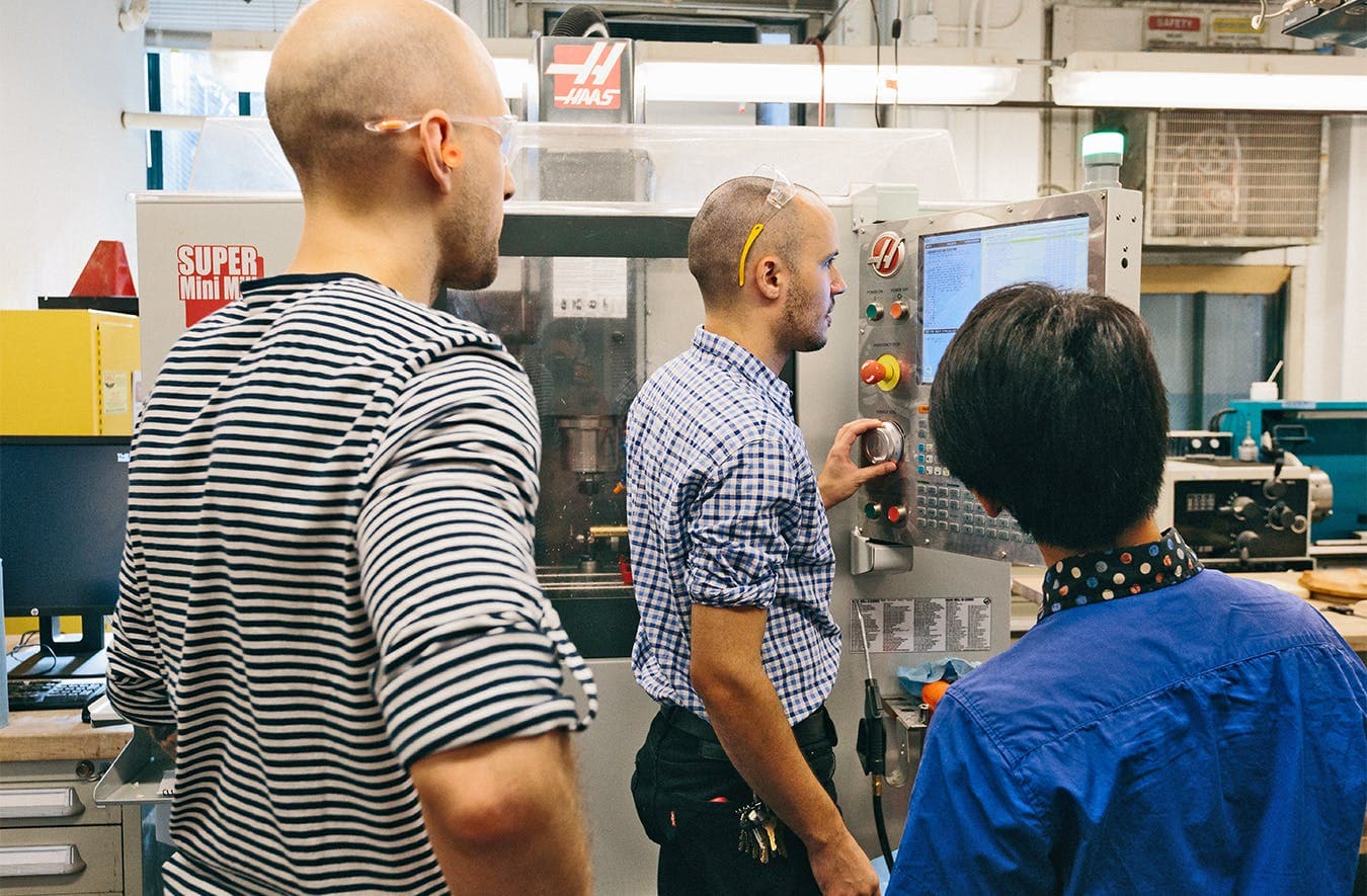 Students gather around the Haas CNC machine in the new Making Center, a network of creative facilities and collaborative spaces that offer students access to cutting-edge technologies and opportunities to develop industry-ready skills.